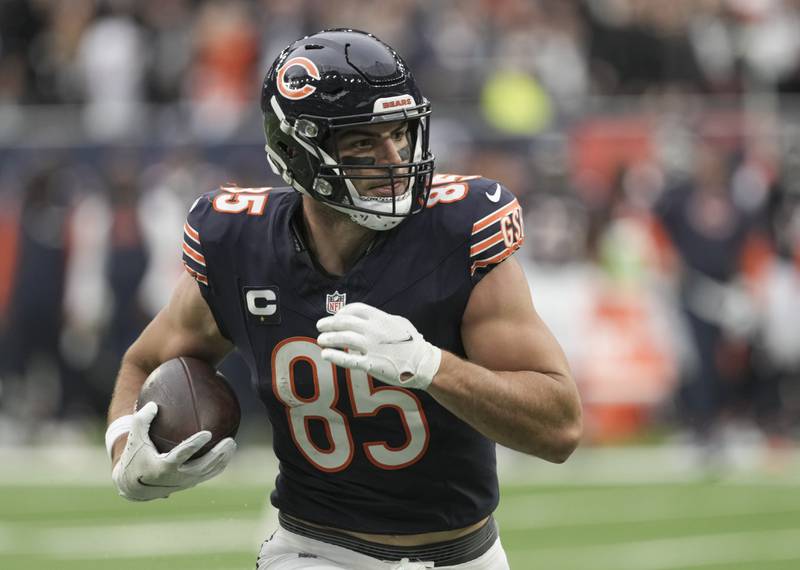Chicago Bears Tight End (85) Cole Kmet runs with the ball during NFL Game between Chicago Bears and Jacksonville Jaguars at Tottenham Hotspur Stadium Sunday ,Oct. 13, 2024 in London, (AP Photo/Dave Shopland)