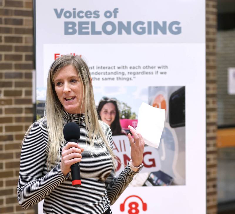 Stacy Hoste, station general manager for 89.5 WNIJ, talks during the opening reception for the Voices of Belonging exhibit Thursday, March 31, 2022, in Founders Memorial Library at Northern Illinois University in DeKalb. The station was a key contributer to the completion of the exhibit.