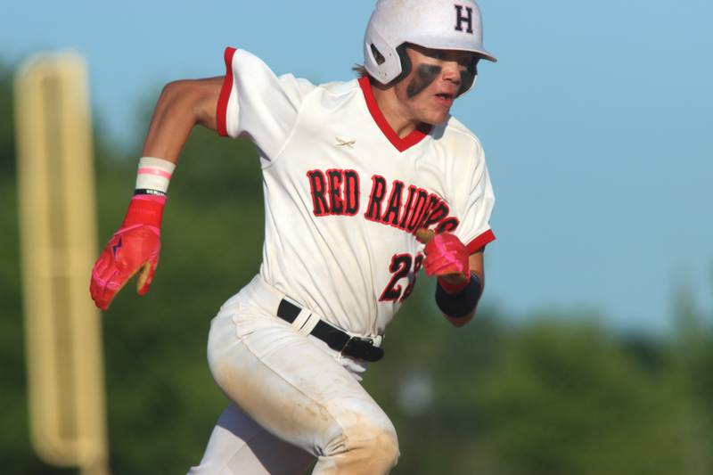 Huntley’s Kyle Larson legs out a triple against Barrington in sectional semifinal baseball action at Hampshire Wednesday.