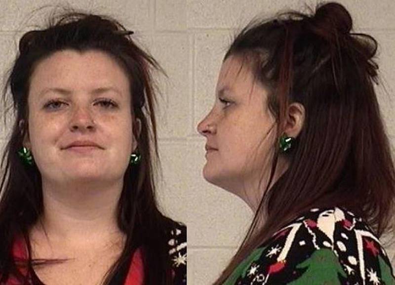 Erica A. Huggins was charged with driving under the influence and improper lane use.