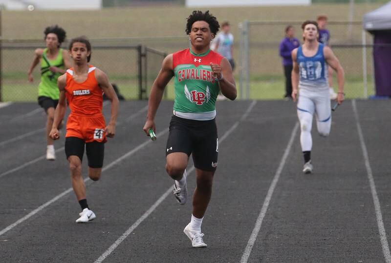 L-P's Kanny Tran competes in the 4x200 meter relay during the Class 2A track sectional meet on Wednesday, May 17, 2023 at Geneseo High School.