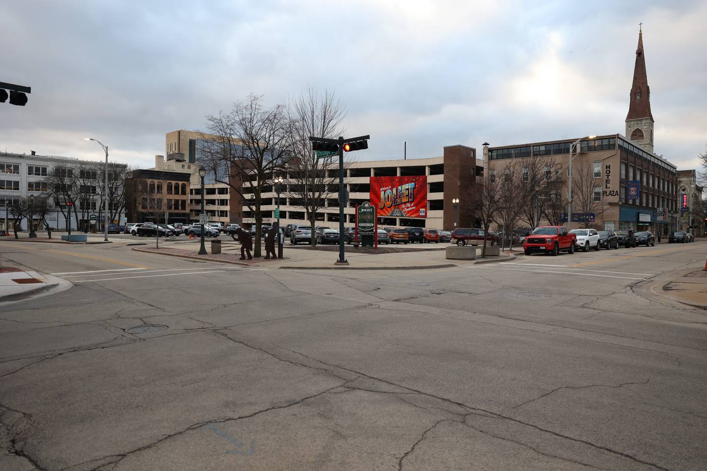 The parking lot across from the Rialto Square Theatre at the corner of Clinton and Chicago streets is the site of the proposed downtown plaza, which will include raising the surrounding streets level with the plaza.