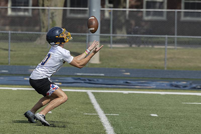 Sterling players run through drills during first day of football practice Monday, August 7, 2023.