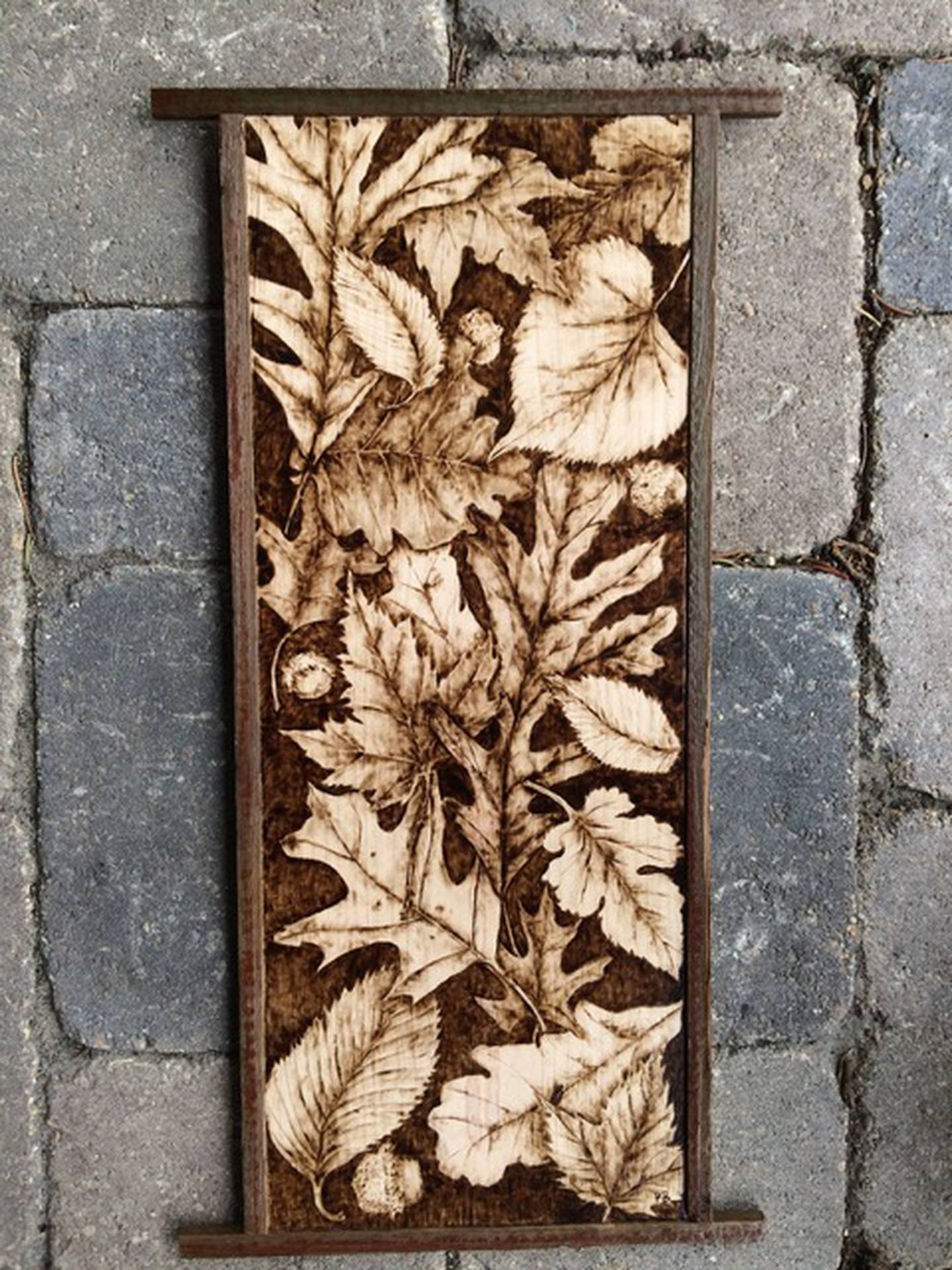 Wood burning art piece created by KVAL artist Pam Bradford
