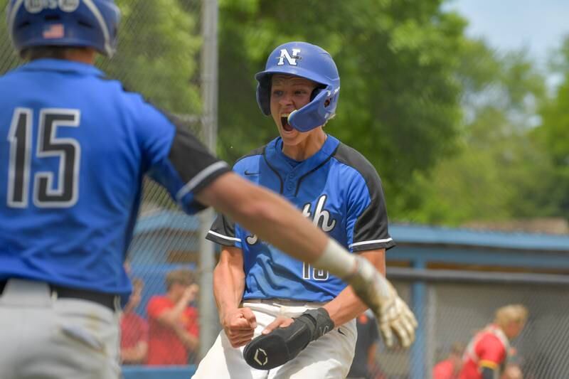 St. Charles North's Parker Reinke (13) scores against the Batavia during the Geneva Regional Championship on Saturday, May 27, 2023.