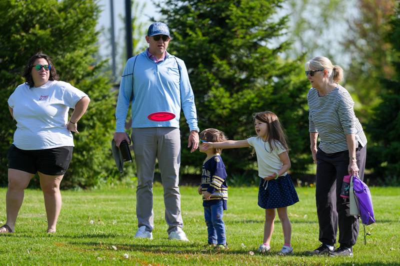 Community members participate in Glen Ellyn Park District Ace Race disc golf event at Maryknoll Park in Glen Ellyn, IL on Saturday May 10th, 2025.  The Ace Race is just one of many events the Glen Ellyn Park District holds throughout the year.