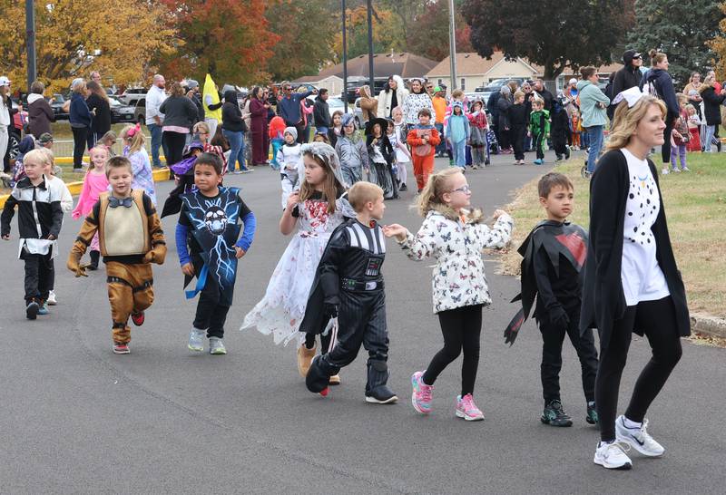 Students from Jefferson Elementary walk around the school during a Halloween parade on Friday, Oct. 31, 2025 in Princeton.