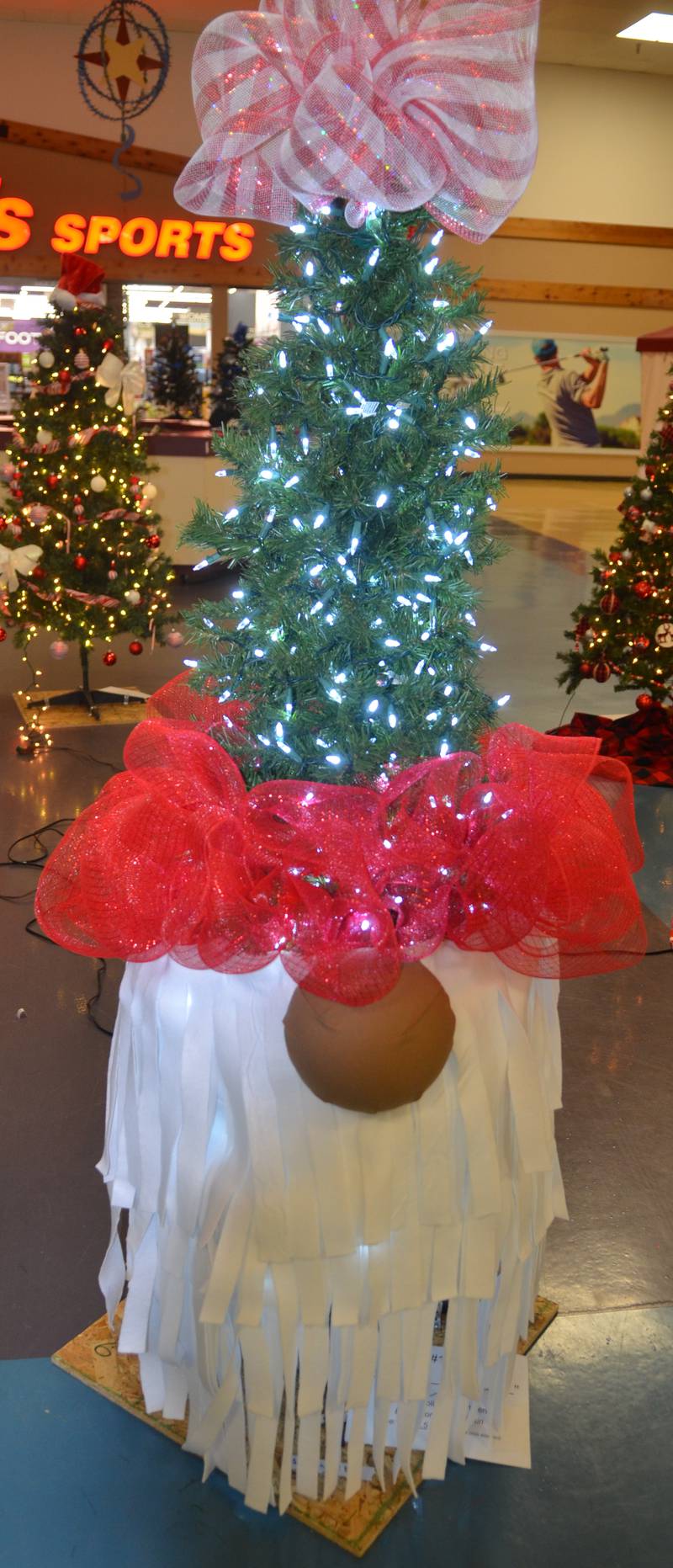 The Sterling Police Department's gnome-themed Christmas tree stands ready to greet visitors to the Festival of Trees at Northland Mall in Sterling.