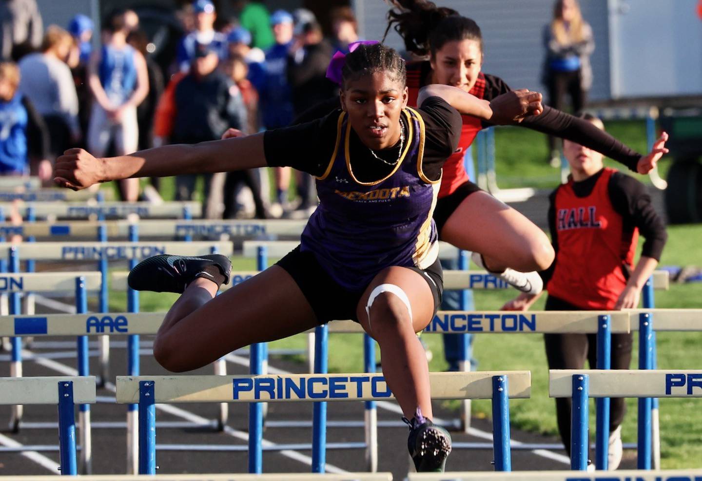 Mendota's Mariyah Elam races to a first-place finish in the 100 hurdles in Monday's Ferris Invite at Princeton.
