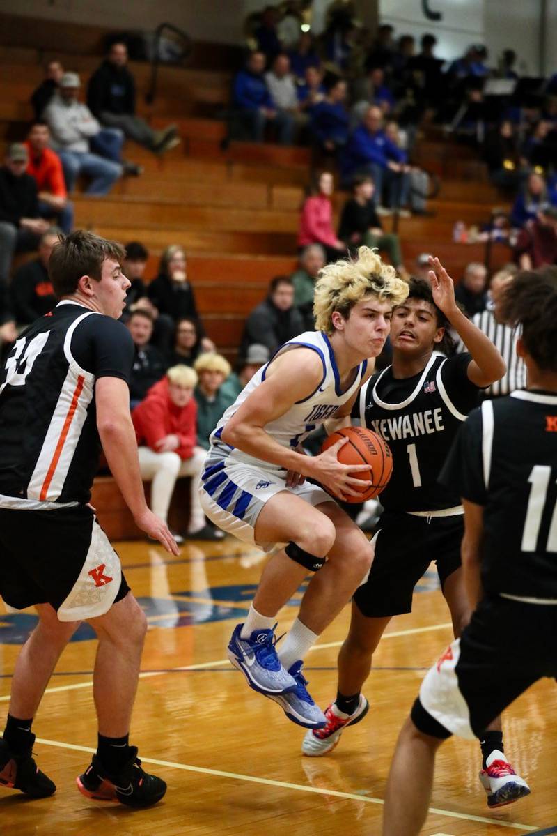 Princeton's Landon Roark skips in for a first-half basketball against Kewanee Tuesday night at Prouty Gym. The Tigers won 61-55.