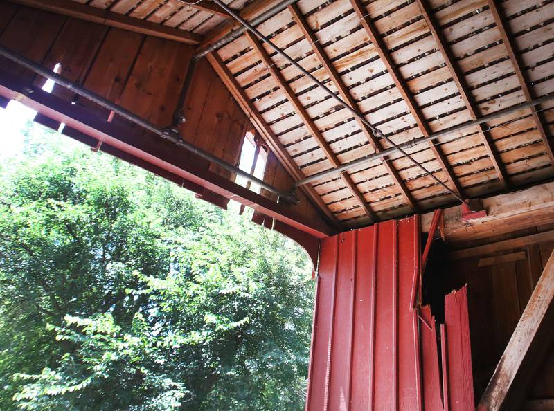 An interior view of the damage on the Red Covered Bridge on Monday, June 30, 2025 in Princeton. Last Friday, the Illinois Department of Transportation announced that the historic bridge enters next rehabilitation phase. Phase II includes the preparation of a detailed cost estimate and expected to take 12 to 18 months to complete and will result in advertising a repair contract to bidders. Approximately $1 million is identified to pay for the needed repairs in IDOT’s most recent multiyear program. A view of the Red Covered Bridge on Monday, June 30, 2025 in Princeton. Last Friday, the Illinois Department of Transportation announced that the historic bridge enters next rehabilitation phase. Phase II includes the preparation of a detailed cost estimate and expected to take 12 to 18 months to complete and will result in advertising a repair contract to bidders. Approximately $1 million is identified to pay for the needed repairs in IDOT’s most recent multiyear program. The bridge survived a number of threats, both intentional and unintentional, including arson, erosion and high winds. It also has survived several strikes by large trucks with it's most recent strike in 2023.
