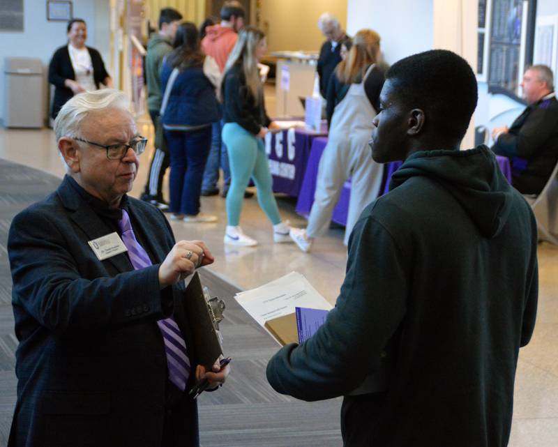 David Kuester, Illinois Valley Community College's speech/theater professor, speaks with a prospective student during a college open house last spring. The Explore IVCC open houses give students and families a chance to meet faculty and program coordinators, explore programs, and tour the college. An Explore IVCC session for prospective fall students is scheduled for Wednesday, July 17.