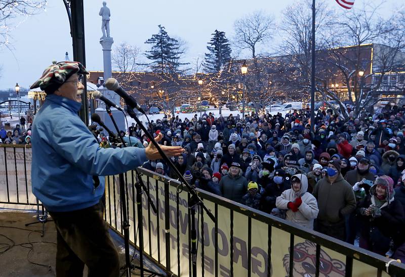 Richard Henzel entertains the crowd with his radio voice from the movie before Woodstock Willie makes his prognostication Wednesday, Feb, 2, 2022, during the annual Groundhog Day Prognostication on the Woodstock Square. This is the 30th anniversary of when the movie “Groundhogs Day” was filmed in Woodstock.