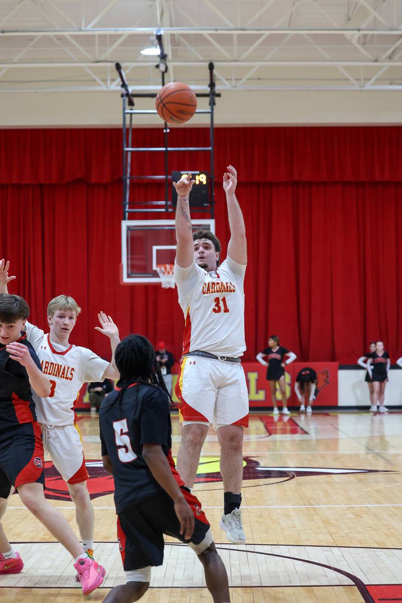 St. Anne's Brandon Schoth goes up for a shot during St. Anne's 64-43 victory over Momence in the River Valley Conference semifinals on Tuesday, Feb. 10, 2026.