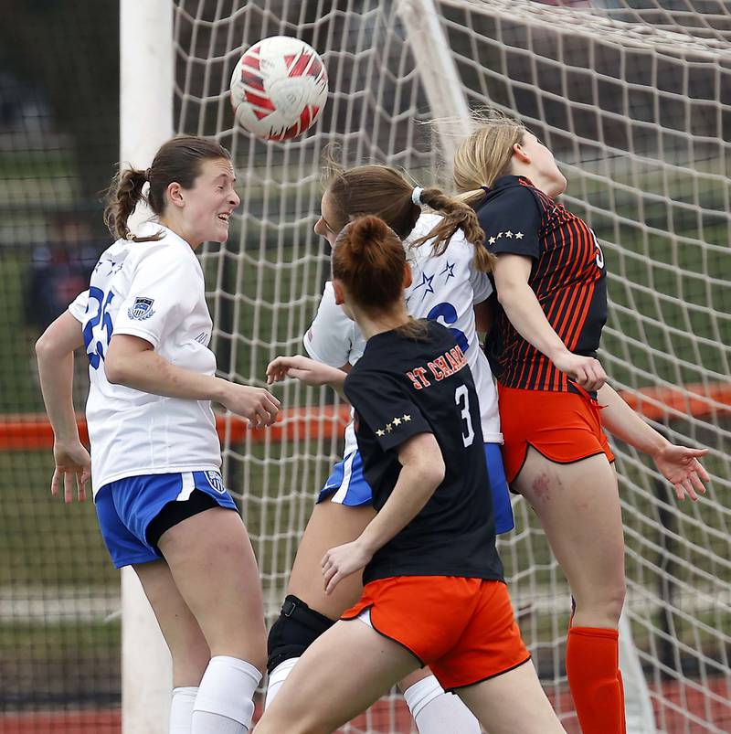 St. Charles North's Kaitlin Glenn (25) tries to head the ball into the net during the championship game of the Rose Augsburg Drach Invitational Saturday, March 29, 2025 in St. Charles Ill.