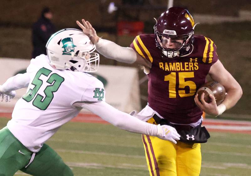 Loyola Academy's Ryan Fitzgerald picks up yardage as he holds off York’s Thomas Hosler during their Class 8A state championship game Saturday, Nov. 30, 2024, in Hancock Stadium at Illinois State University in Normal.