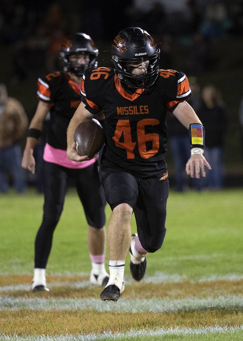 Milledgeville’s Spencer Nye picks up yards against Polo Friday, Oct. 4, 2024, at Milledgeville High School.
