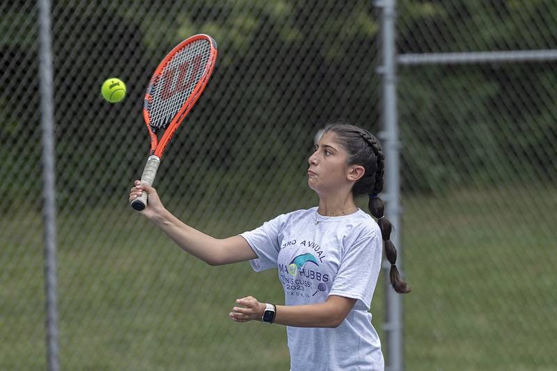 Fareeda Alkhalaf returns a shot during a doubles match Thursday, July 27, 2023 at the Emma Hubbs Tennis Classic in Dixon.