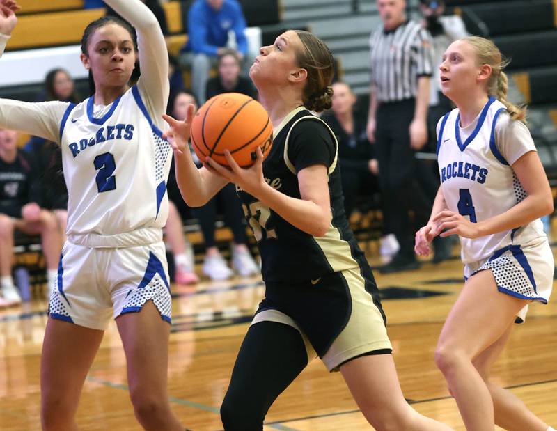 Sycamore's Quinn Carrier goes to the basket against Burlington Central's Jordyn Charles Thursday, Feb. 19, 2026, during their Class 3A regional championship game at Sycamore High School.