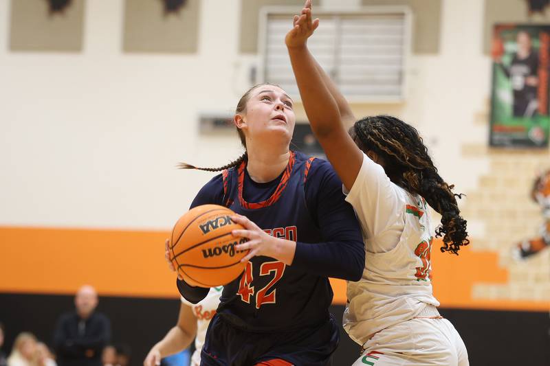 Oswego’s Kendall Grant battles for a shot against Plainfield East on Tuesday, Jan. 13, 2026 in Plainfield.