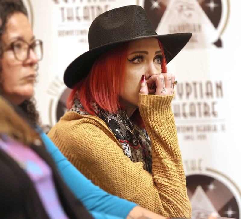 Sylvia King, from DeKalb, becomes emotional as she listens to speakers Monday, Oct. 3, 2022, at the Egyptian Theatre during the Safe Passage domestic violence vigil.