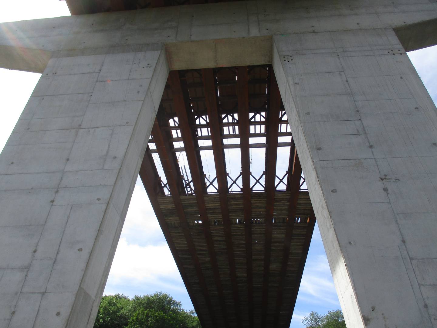 A view from below the Eldamain Road bridge, showing one of the gigantic concrete piers supporting the steel I-beams that will in turn support the road deck. (Mark Foster -- mfoster@shawmedia.com)