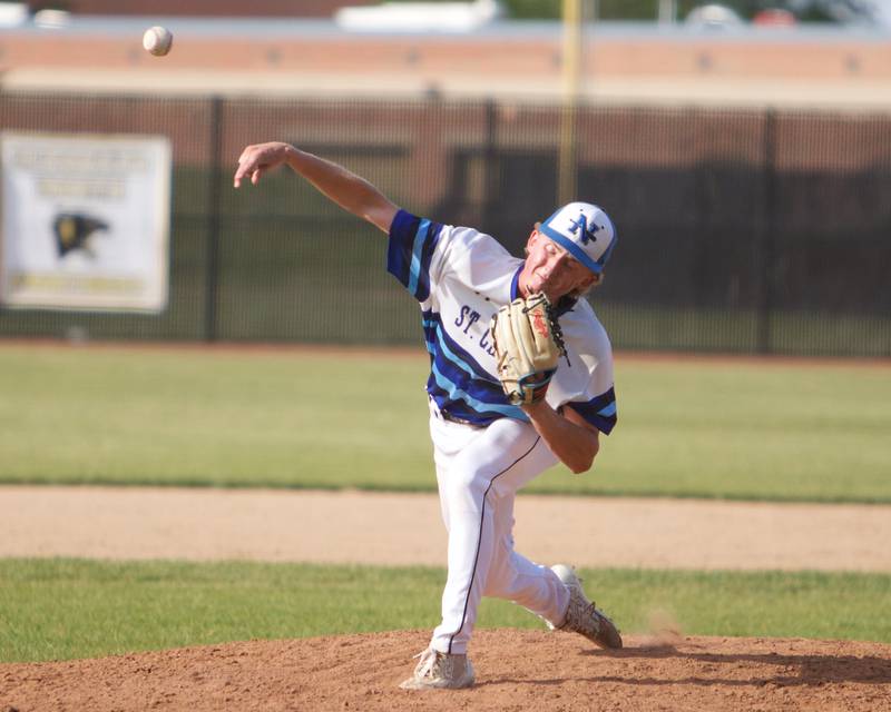 St. Charles North's Jacob Kujak delivers a pitch against York at the Class 4A Sectional Final on Friday May 31, 2024 in St. Charles.