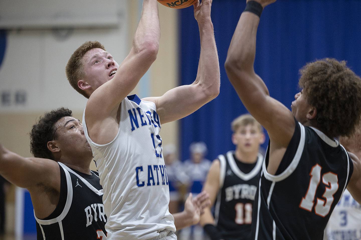 Newman’s George Jungerman works down low against Byron Tuesday, Dec. 3, 2024, at Newman High School.