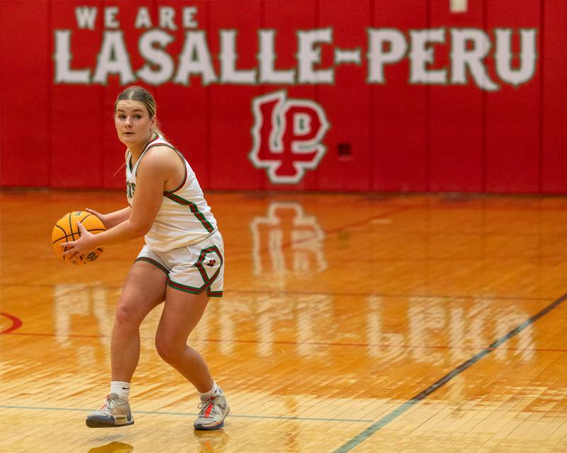 Emma Jereb (5) of LaSalle-Peru dribbles ball up court on Wednesday, December 17, 2025 at Sellet Gymnasium in LaSalle.