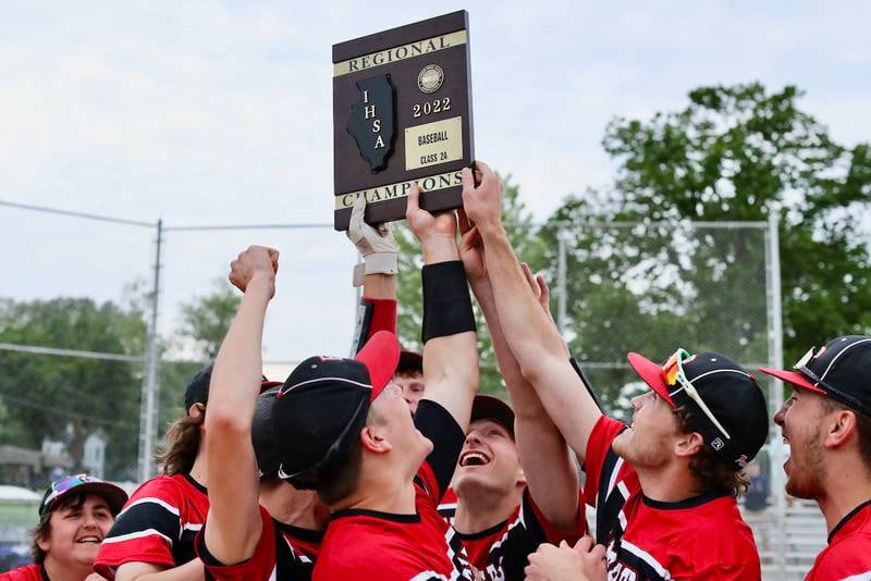 Erie-Prophetstown celebrates their 5-2 victory over Bureau Valley in Monday's regional championship at Princeton.