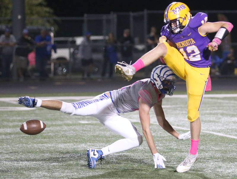 Mendota punter Braiden Freeman drops the punt as Princeton's Noah LaPorte attemps to block it on Friday, Oct. 11, 2024 at Mendota High School.
