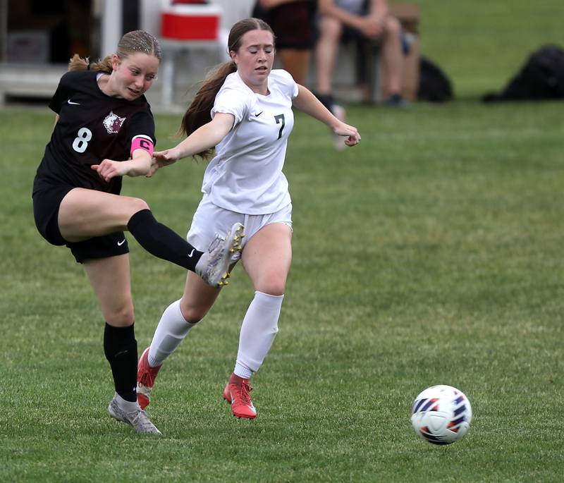 Prairie Ridge's Sierra Greenwell kicks the ball down the field as she is defended bu Crystal Lake South's Ellie Starnes during a Class 2A Crystal Lake Central Regional girls soccer semifinal match on Tuesday, May 19, 2026, at Crystal Lake Central High School.