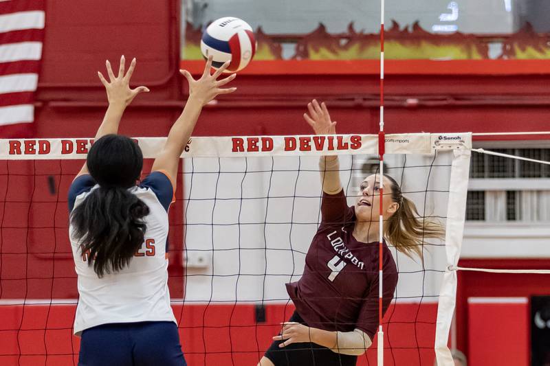 Lockport's Mikayla Marshall goes-up for a kill during a 4A Supersectional girls volleyball game against Oak Park-River Forest at Hinsdale Central on Nov. 10, 2025.