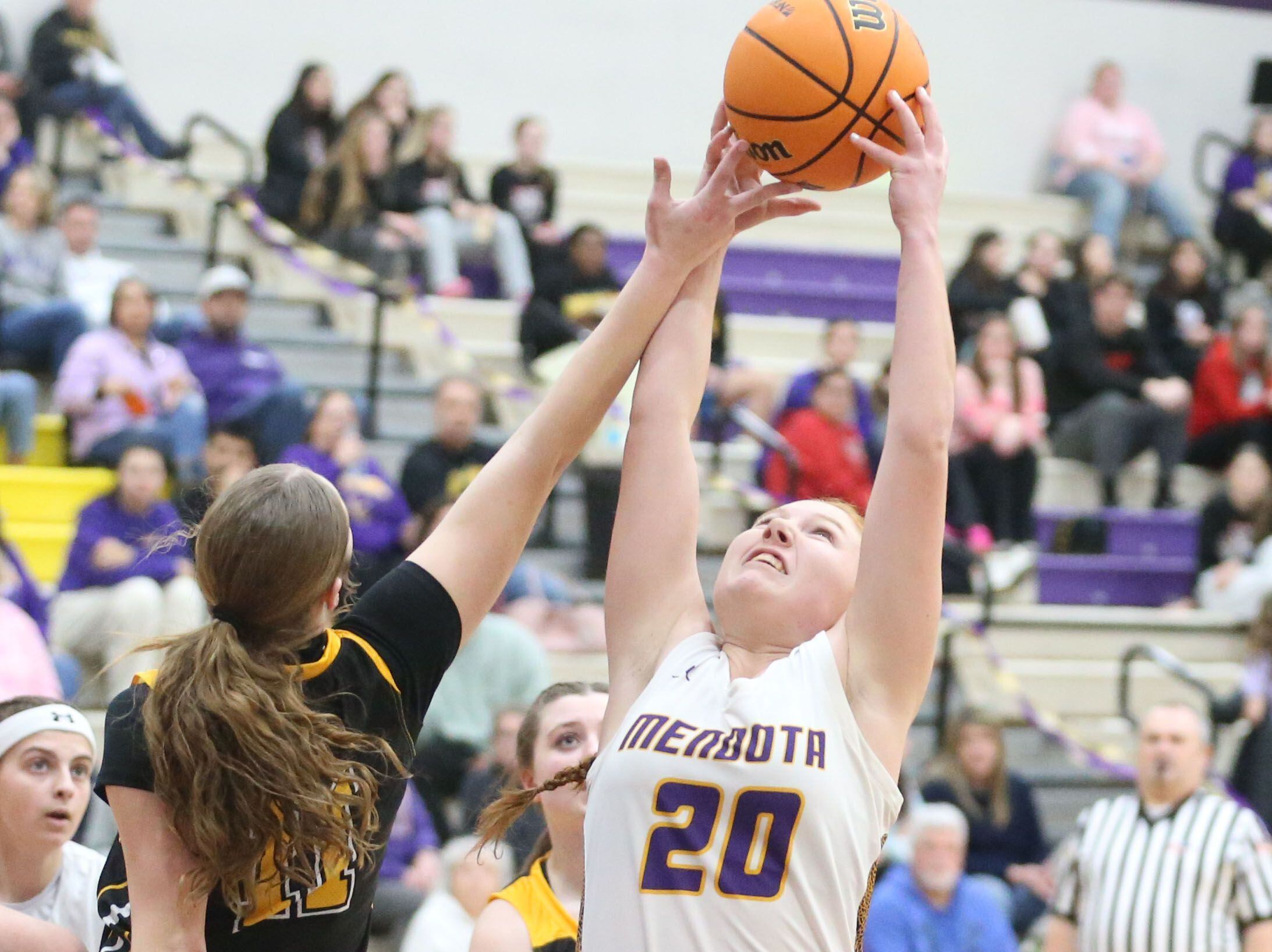 Mendota's Emily Sondgeroth grabs a rebound over Putnam County's Chloe Parcher on Tuesday, Feb. 10, 2026 at Mendota High School.