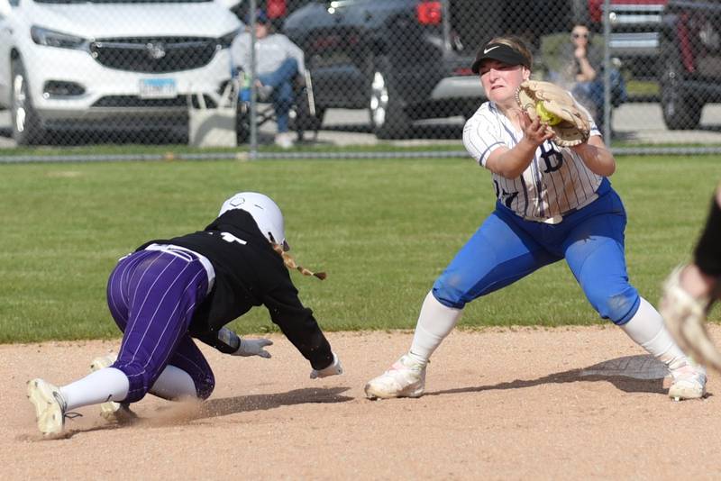 Milford-Cissna Park's Lillie Harris, right, fields a throw at second and looks to tag an Oakwood runner during a game at Milford Wednesday, April 16, 2025.