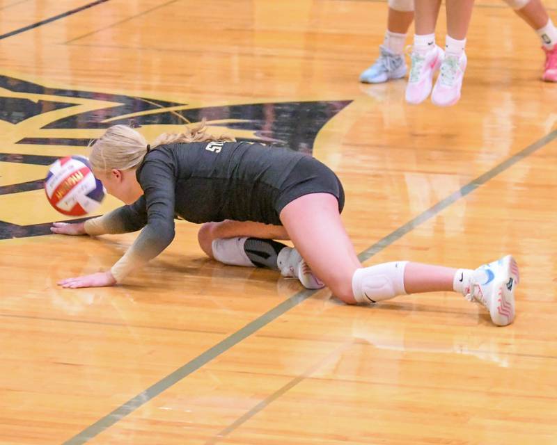Sycamore's Madilyn Patton (2) keeps the volley alive during the game on Wednesday Aug. 27, 2025, while taking on DeKalb held at Sycamore High School.