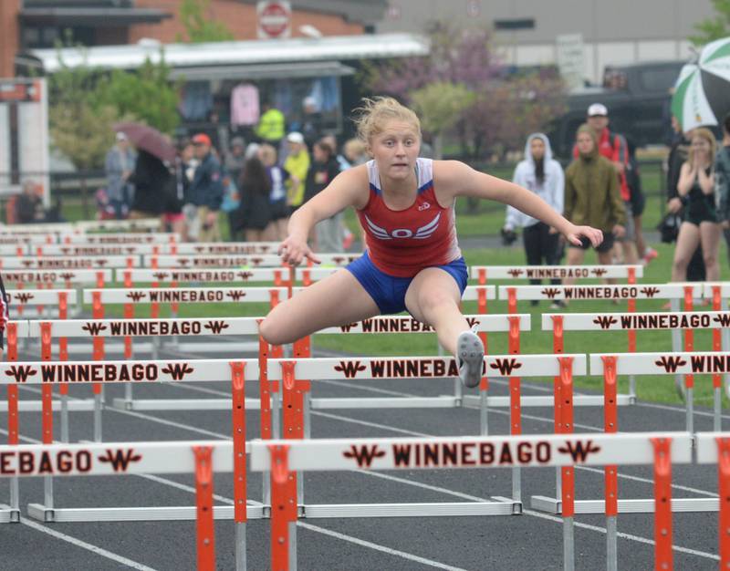 Oregon's Sophie Stender heads to the finish line in the 100 hurdles at the 1A Winnebago Sectional on Friday, May 12.