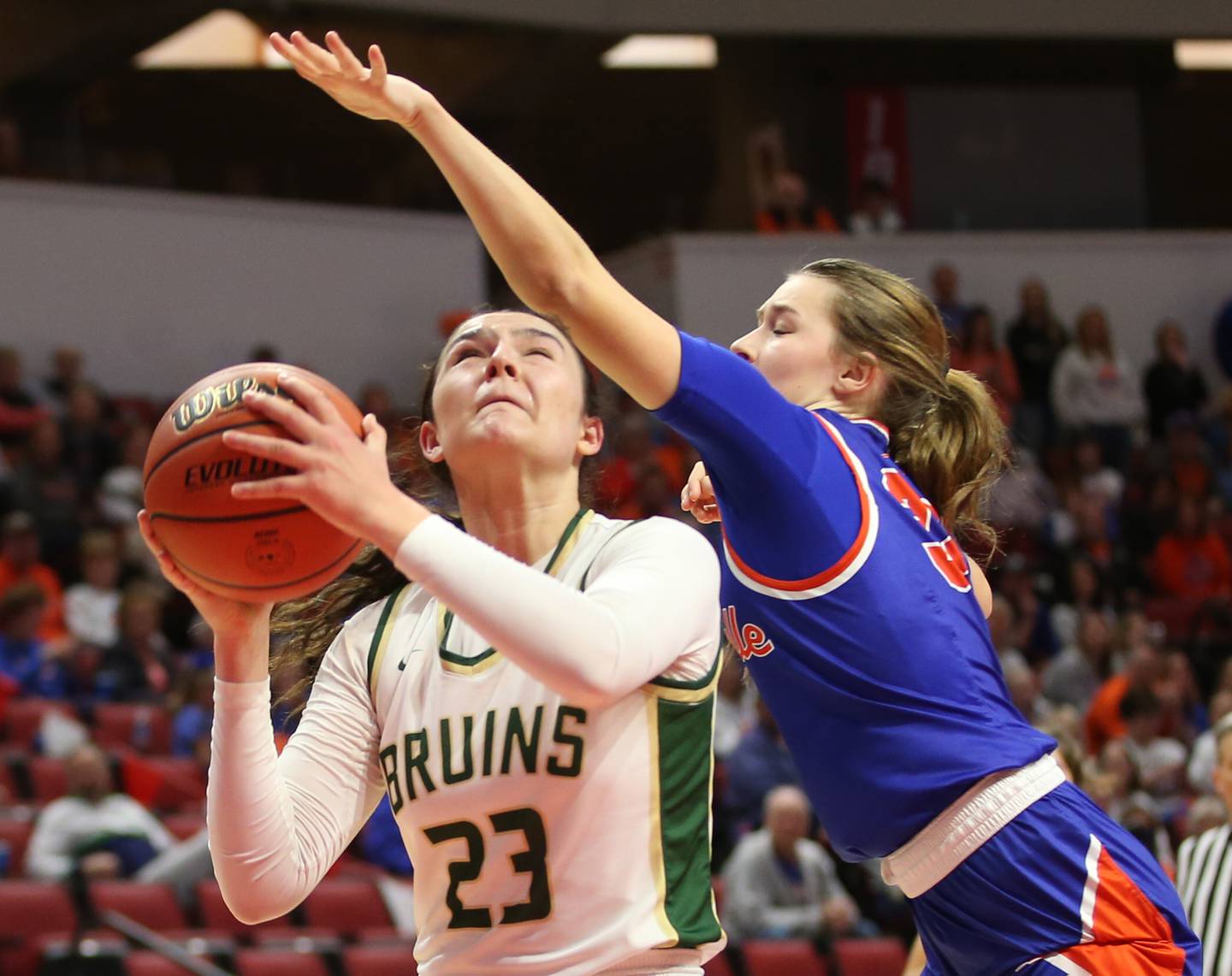 St. Bede's Ali Bosnich eyes the hoop as Okawville's Kenley Hackstadt defends during the Class 1A State semifinal game on Thursday, Feb. 29, 2024 at CEFCU Arena in Normal.