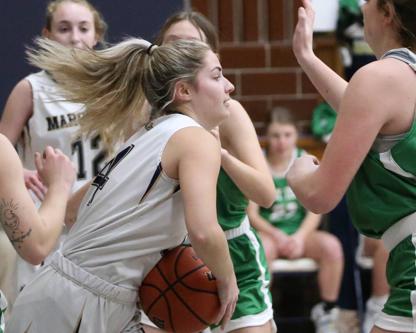 Marquette's Eva McCallum grabs a rebound in the lane against Seneca in Bader Gym on Monday, Jan. 23, 2023 at Marquette High School.