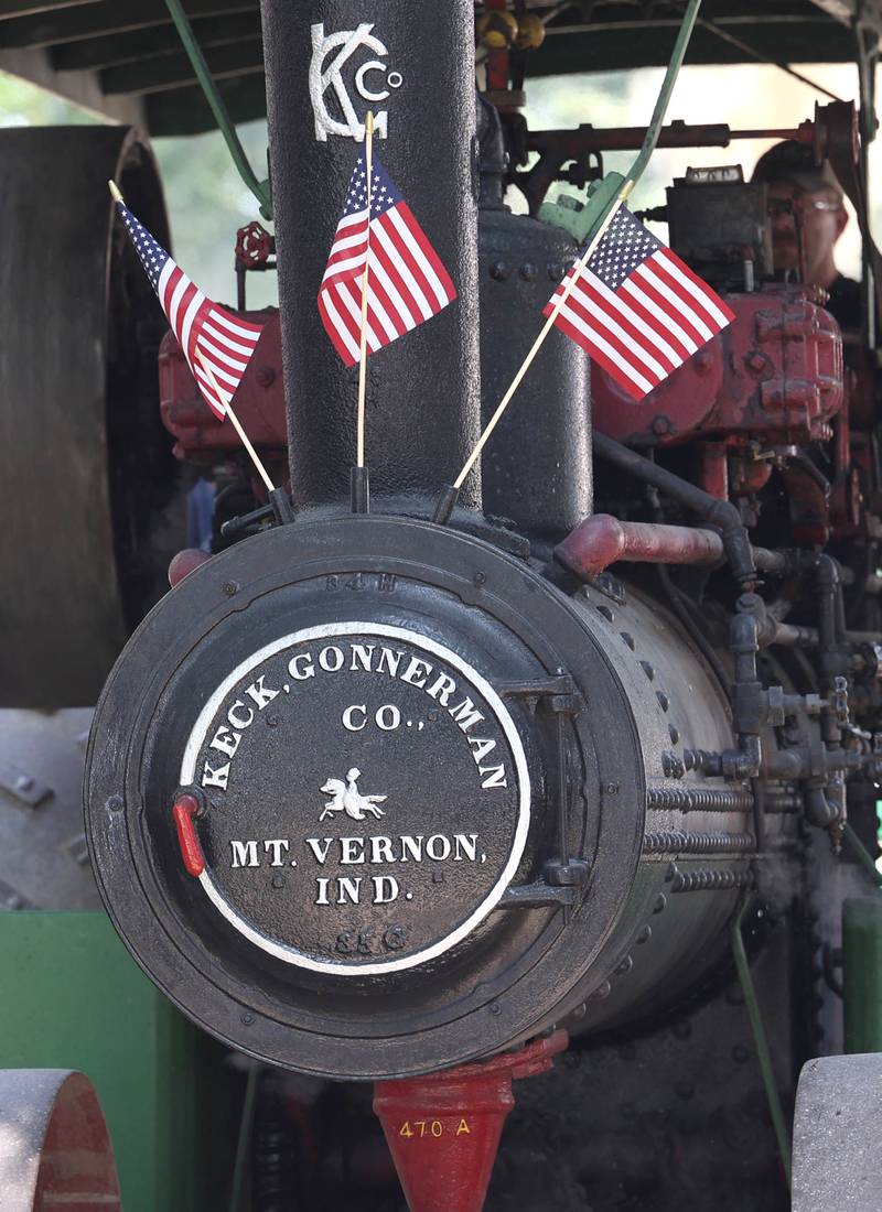 A Keck, Gonnerman Company steam tractor makes its way down the parade route Thursday, Aug. 8, 2024, during the 67th annual Sycamore Steam Show and Threshing Bee at Taylor Marshall Farm.