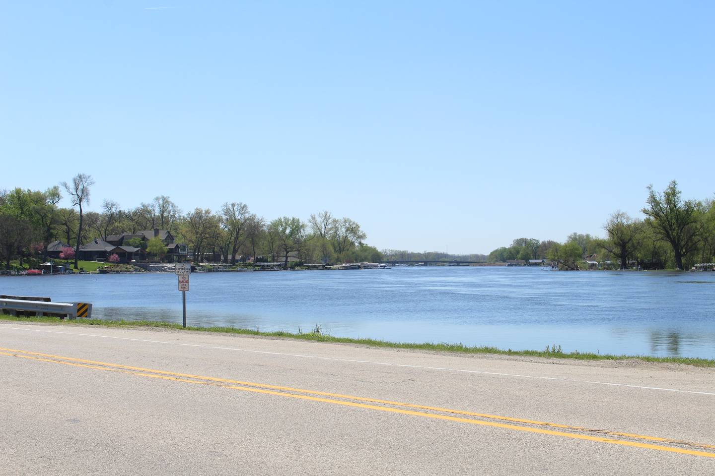 High waters on the Fox River nearly reach a portion of North River Road in McHenry on April 25, 2026.