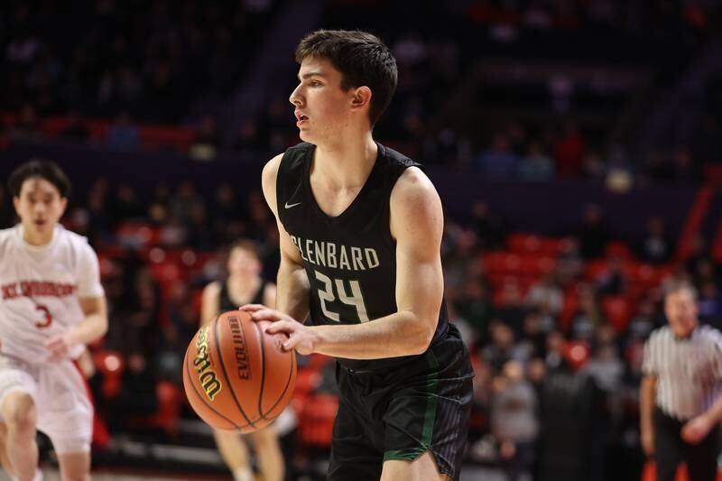 Glenbard West’s Paxton Warden looks to make a play against Bolingbrook in the Class 4A semifinal at State Farm Center in Champaign. Friday, Mar. 11, 2022, in Champaign.