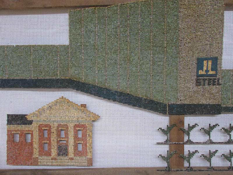 John “Junior” Washington created an 8 foot long mosaic of the J&L steel mill and Putnam County Court House using colored soybeans inserted in wire mesh.