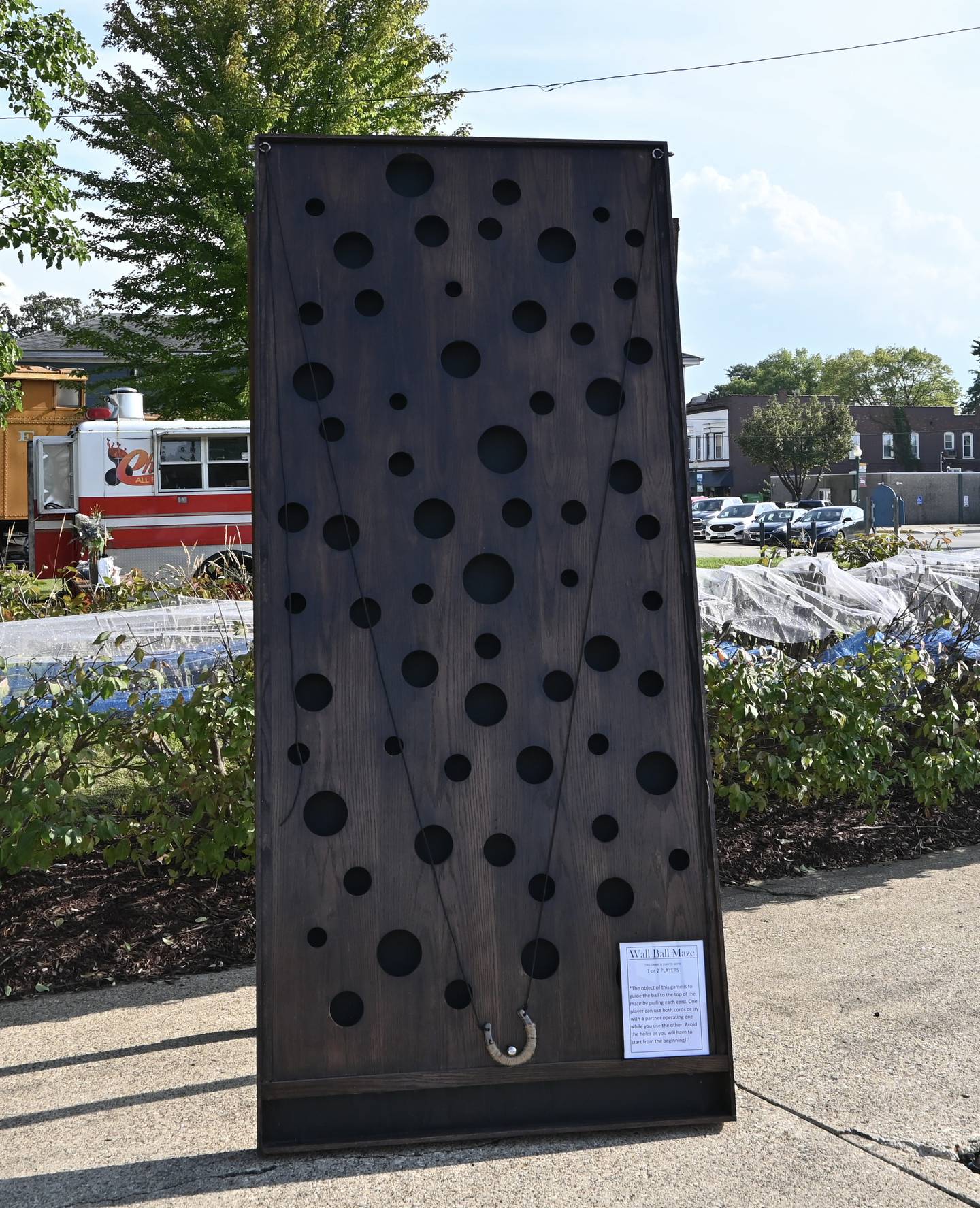 Wall Ball Maze created by Kyle Borchers owner of AppleJax Creations is available for rent. Contact at applejaxwood@yahoo.com.