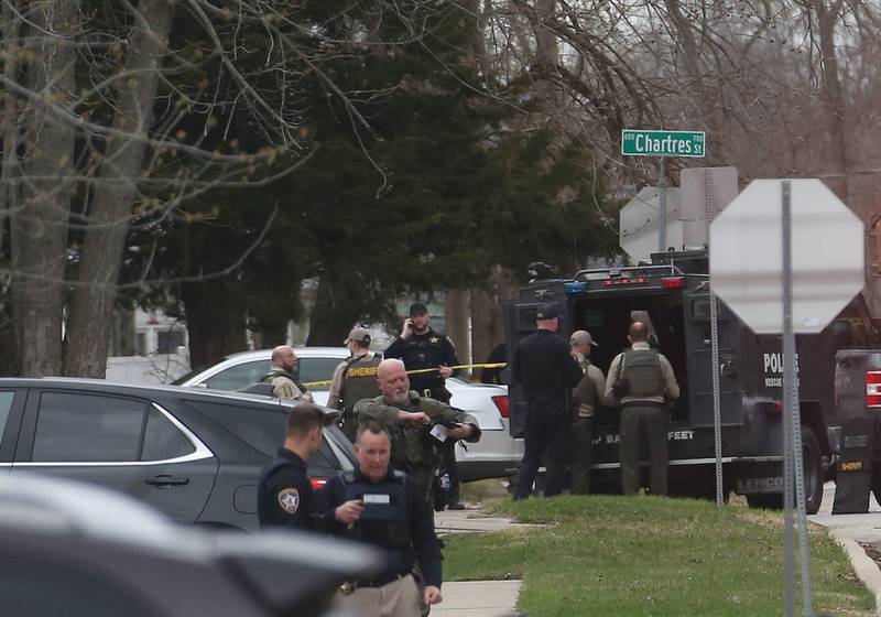 Police secure the scene of a two-story apartment building on the corner of Seventh and Charters on Sunday, March 30, 2025 in La Salle. A barricaded armed subject fired shots at officers. Police from across the Illinois Valley assisted in the incident.