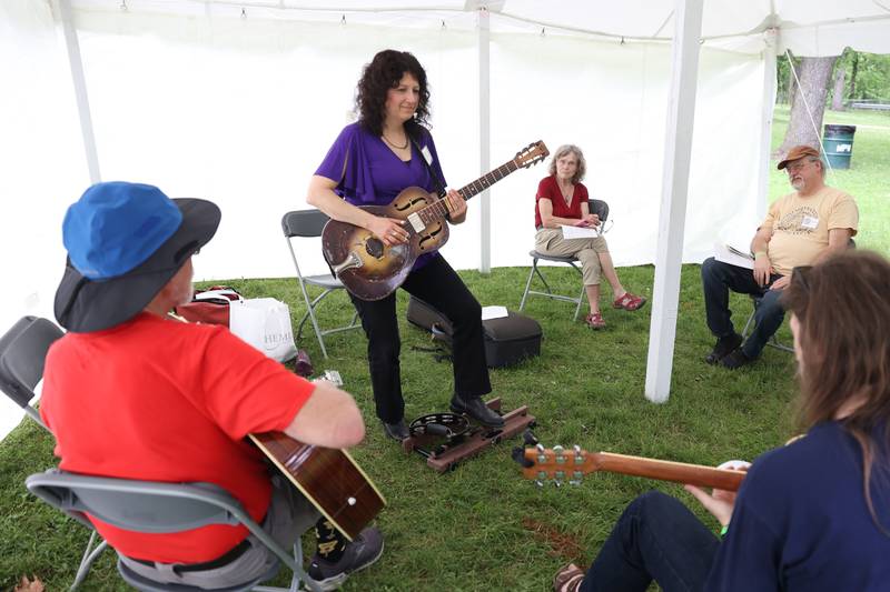 Donna Herula leads a workshop on Intro to Slide Guitar at the Gebhard Woods Dulcimer & Traditional Music Festival on Saturday June 8, 2024 in Morris.