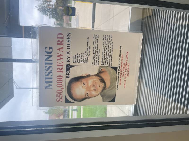 A missing persons flyer is seen Oct. 22, 2025, in the lobby at the DeKalb Police Department.