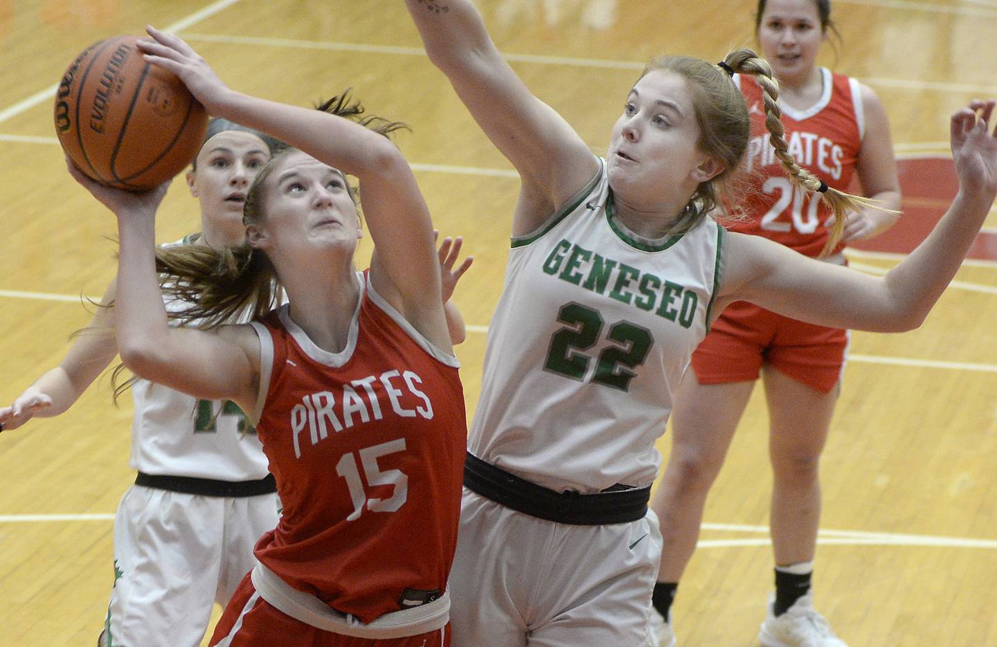 Ottawa’s Hailey Larsen shoots around the attempted block by Geneseo’s Danielle Beach in the 1st period during the Class 3A Regional title on Thursday, Feb. 16, 2023 at Ottawa High School.