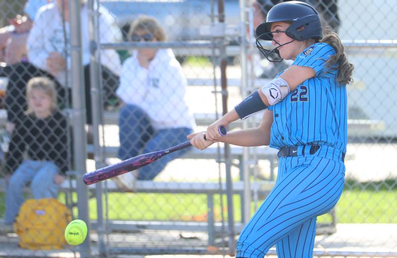 Marquette's Kinley Rick makes contact with the ball on Tuesday, April 23, 2026 at June Cross Field in Ottawa.