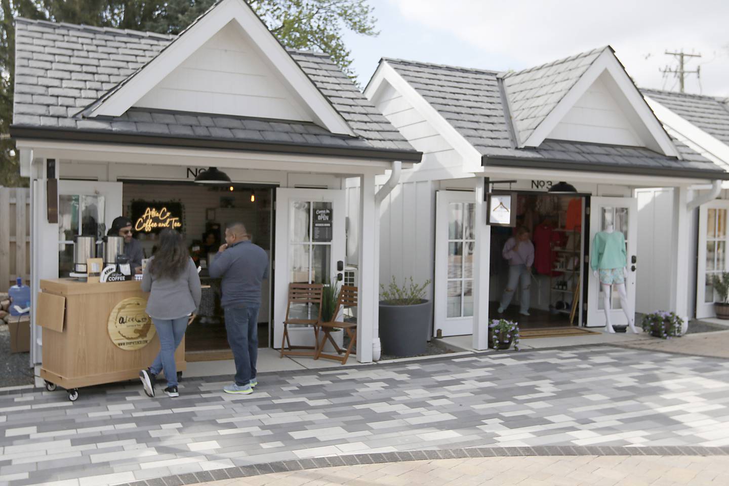 People shop on Friday, May 2, 2025, at the McHenry Riverwalk Shoppes on the first day of the 2025 season.